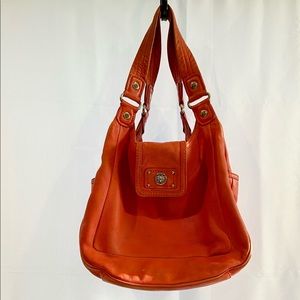 Marc Jacobs Turnlock Slouch Bag.